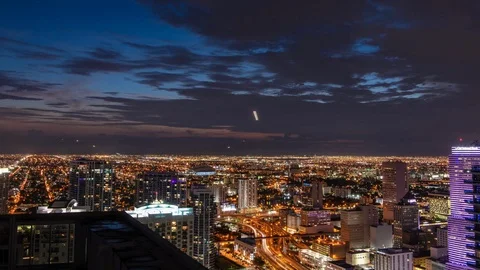 Time-lapse of dark clouds moving over Miami cityscape from sunset to night Stock-Footage 116346503