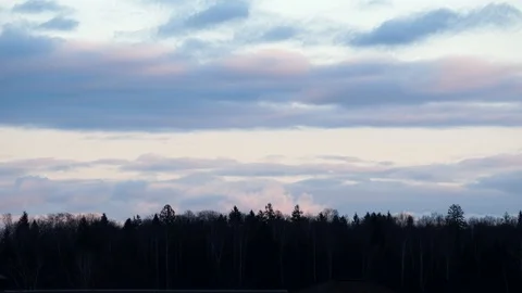 Time-lapse of Dark Clouds Over Forest Stock Footage 125397596