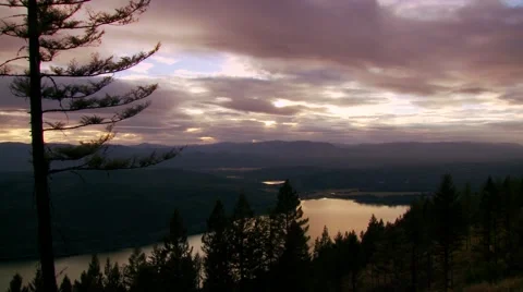 Time lapse of dark clouds at sunset Stock Footage 60691621