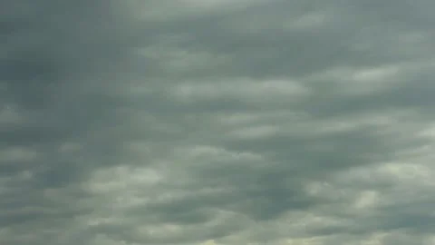 Time lapse dark cumulus clouds receding into the distance Stock Footage 141810099