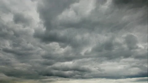 TIME-LAPSE: Dark cumulus clouds Видео 143882394
