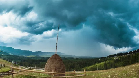 Time lapse of dark dramatic stormy clouds with rain and thunderstorm passing by  Stock Footage 152716696