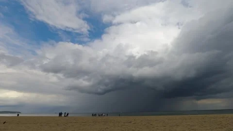 Time Lapse Dark Huge Cloud with Rain over the sea, sky black storm cloud Stock Footage 251877068