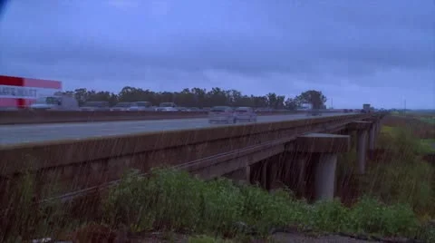 TIME LAPSE DARK RAINING TRAFFIC YOLO CAUSEWAY INTERSTATE 80 CALIFORNIA HD 1080 Stock Footage 22410606