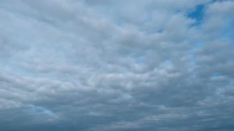 Time lapse of dark stormy clouds after rain on sunset, rolling and building Stock Footage 196205150