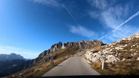 Time lapse dashboard view driving on mountain Mangart road Stock Footage 122768865