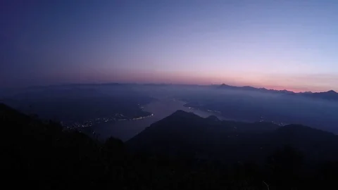 Time-lapse at dawn above Como Lake - no color correction Video stock 79594904