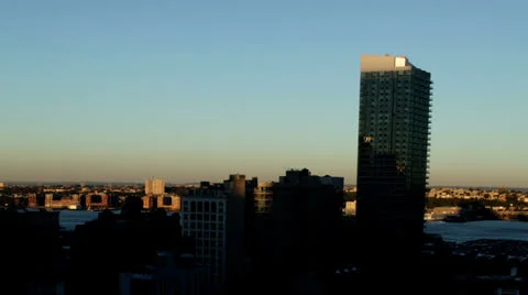 Time lapse of dawn breaking over a district of New York with downward pan Vidéo 26150280