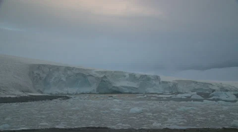 Time lapse. dawn breaks through cloud, Antarctica Stock Footage 34312997