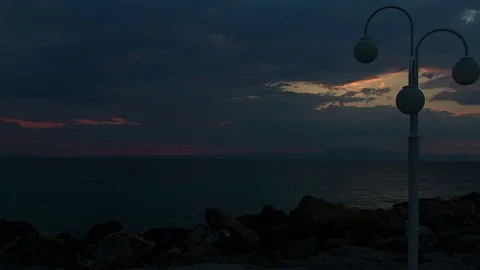 Time lapse of Dawn on the stone quay with lanterns Stock Footage 71350142