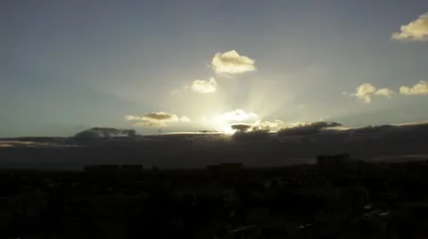 Time lapse - Dawn sun rays through clouds over Venice, CA Stock Footage 21331267