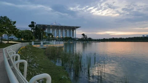 Time lapse from day to dusk of a Mosque at lake side Stock Footage 61297835