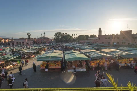 Time-Lapse Of Day To Dusk Over Jemaa El-Fnaa Stock Footage 146103634
