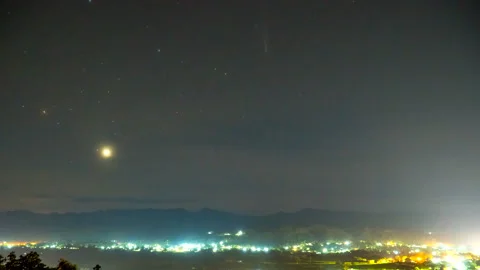 Time-lapse day to night with comet C/2023 A3 Stock Footage 289301980
