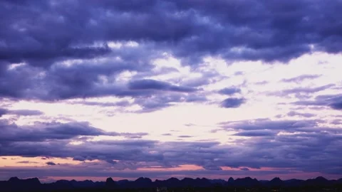 Time lapse day to night of dark blue sky over the jungle Stock Footage 143956216