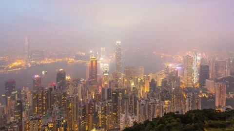 Time Lapse Day To Night Hong Kong City and Mist in Sky (zoom in) Stock Footage 45732973