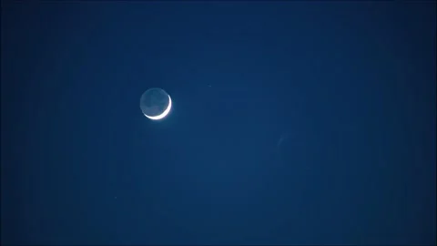 Time lapse day to night: the moon floating the sky 4K Stock Footage 131003962