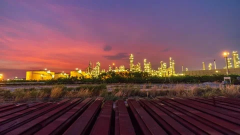 Time Lapse Day to night at refineries and oil tanks, business and petrochemical  Stock Footage 147130990