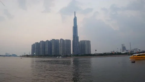 Time lapse day to night riverside skyscraper Stock Footage 158428569