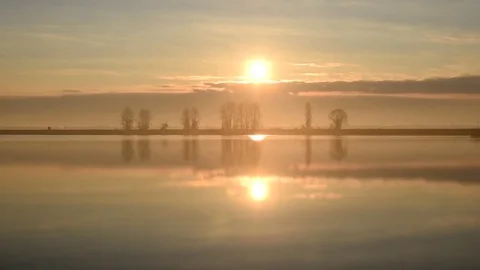 Time lapse of daybreak over lake or river Stock Footage 73829482