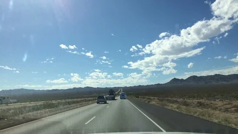 Time Lapse in daytime driving trough the desert Stock Footage 86956625