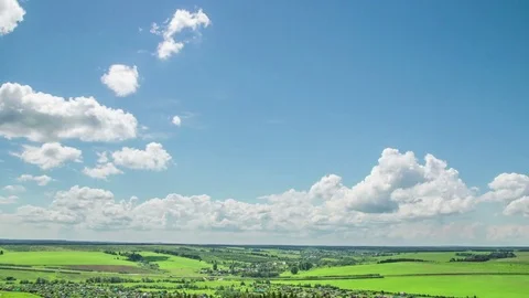 Time lapse daytime sky with fluffy clouds Seamless Loop Stock Footage 77836311