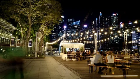 Time lapse of the deck of The Shoppes Marina Bay Sands at night Stock Footage 108746322