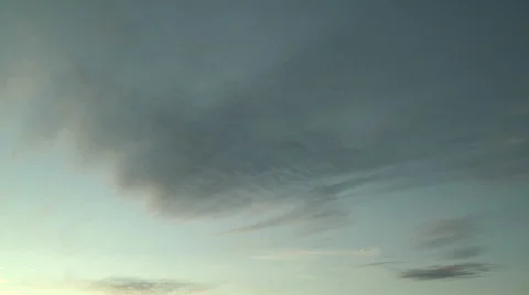 Time Lapse of Delicate Waves in Clouds in Dusk Sky Stock Footage 54730881