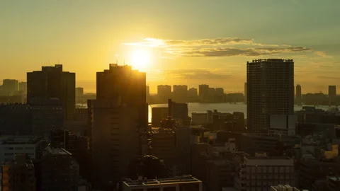 Time Lapse densely packed buildings of Tokyo at sunrise Vídeo Stock 240417843