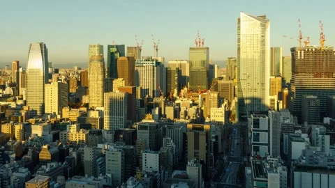 Time Lapse of the densely packed buildings of Tokyo Japan at sunrise Vidéo 242517789
