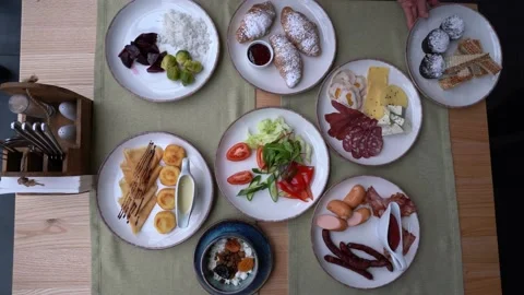 Time lapse. Different dishes are setting on the table.Top Down Video stock 147412579