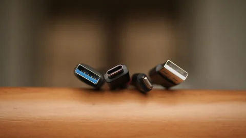Time lapse of different USB plugs, ending with USB-C. Stock Footage 260723825