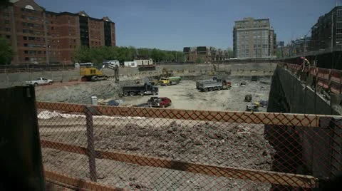 Time lapse of a digger loading trucks with gravel on a construction site. Stock Footage 11237216
