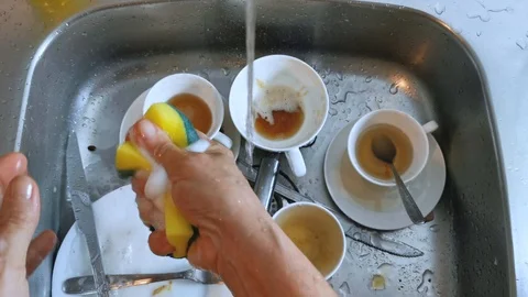 Time lapse. Dish washing routine. Woman washes glasses, cups, cutlery. Stock Footage 128001431