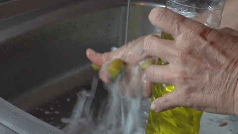 Time lapse. Dish washing routine. Woman washes glasses, cups, cutlery. Stock Footage 128044802