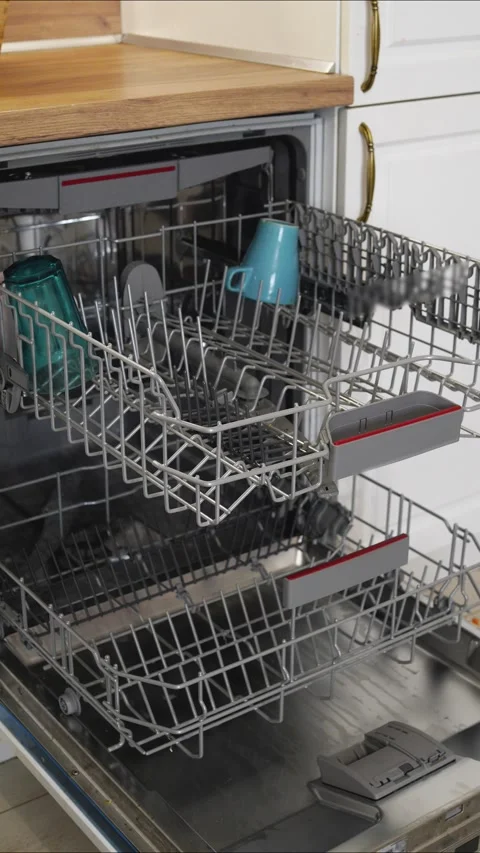 Time Lapse Dishwasher Action: Vertical View of Spotless Dishes Stock Footage 306667186