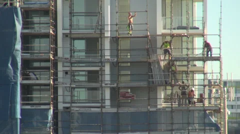 Time lapse dismantling scaffolding on construction site Stock Footage 37487104