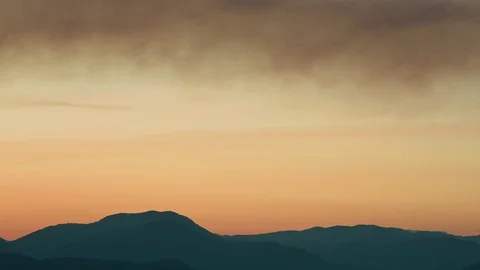 Time Lapse distant beautiful red blood orange sunset smoke ominous eagle creek Stock Footage 81573054