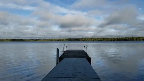 Time lapse dock and lake with passing clouds, Duck Mountain, Manitoba Stock Footage 122145743