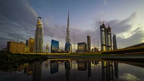 Time-lapse of downtown Dubai at sunset with cityscape reflection Stock Footage 201329846
