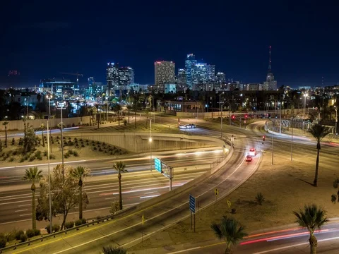 Time lapse of downtown Phoenix at night with freeway and air traffic. Stock-Footage 77582531