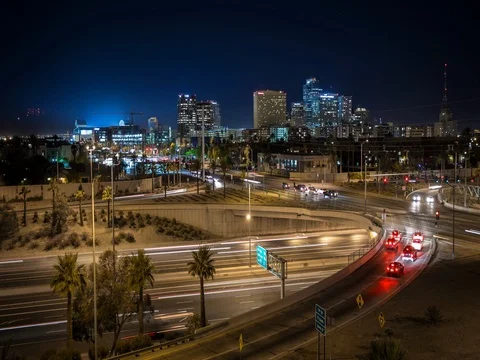 Time lapse of downtown Phoenix at night with freeway and air traffic. Stock-Footage 77613027