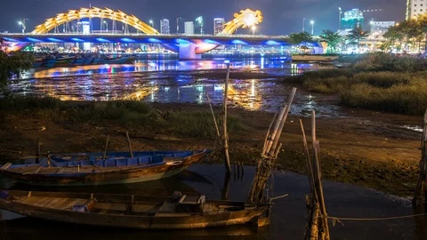 Time Lapse of Dragon Bridge Traffic &amp; Boats at Night- Da Nang Vietnam Stock Footage 87281086