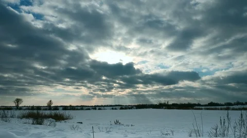 Time-lapse Dramatic Clouds Above Frozen Lake and Snow Covered Plains. Steppe Pra Stock Footage 104918363
