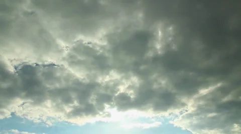 Time lapse dramatic clouds and blue sky with sun Stock Footage 23227265