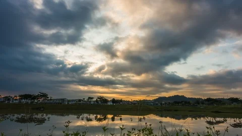 Time-lapse of dramatic clouds and sunrise at Hillpark, Puncak Alam Stock Footage 129861981