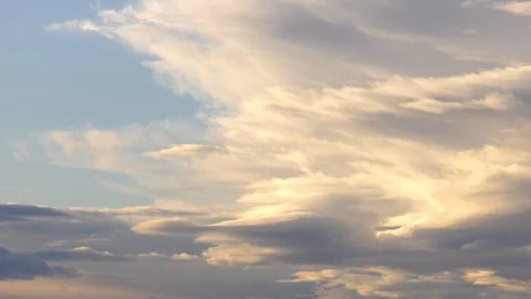 Time-lapse Dramatic Clouds in Morning Light - 4k UHD Video stock 106859783