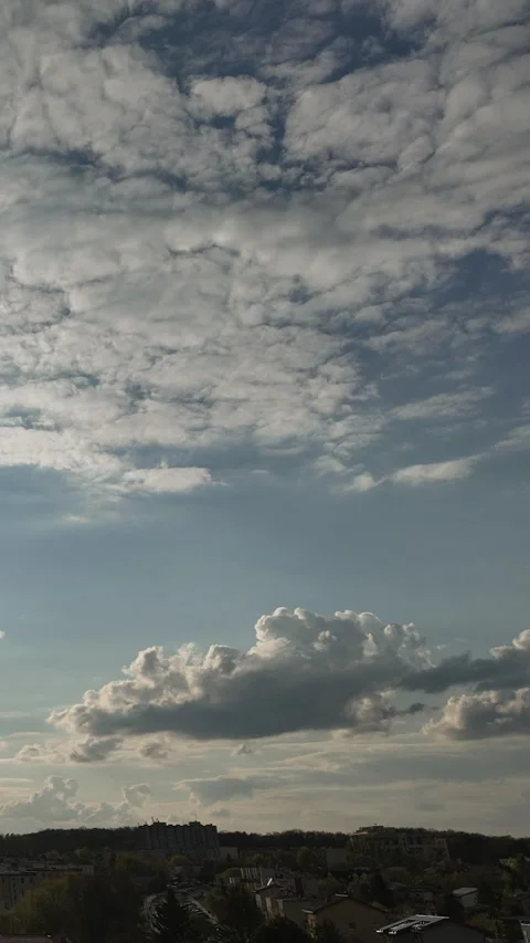Time Lapse Of Dramatic Clouds Moving Over Small Town Horizon Stock Footage 344914504