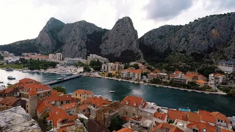 Time lapse of dramatic clouds over the historic town of Omis, Croatia. Stock Footage 94765164