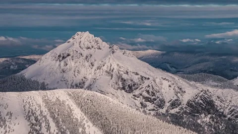 Time lapse Dramatic clouds over majestic frozen alps peak winter mountain nature Stock Footage 170818696